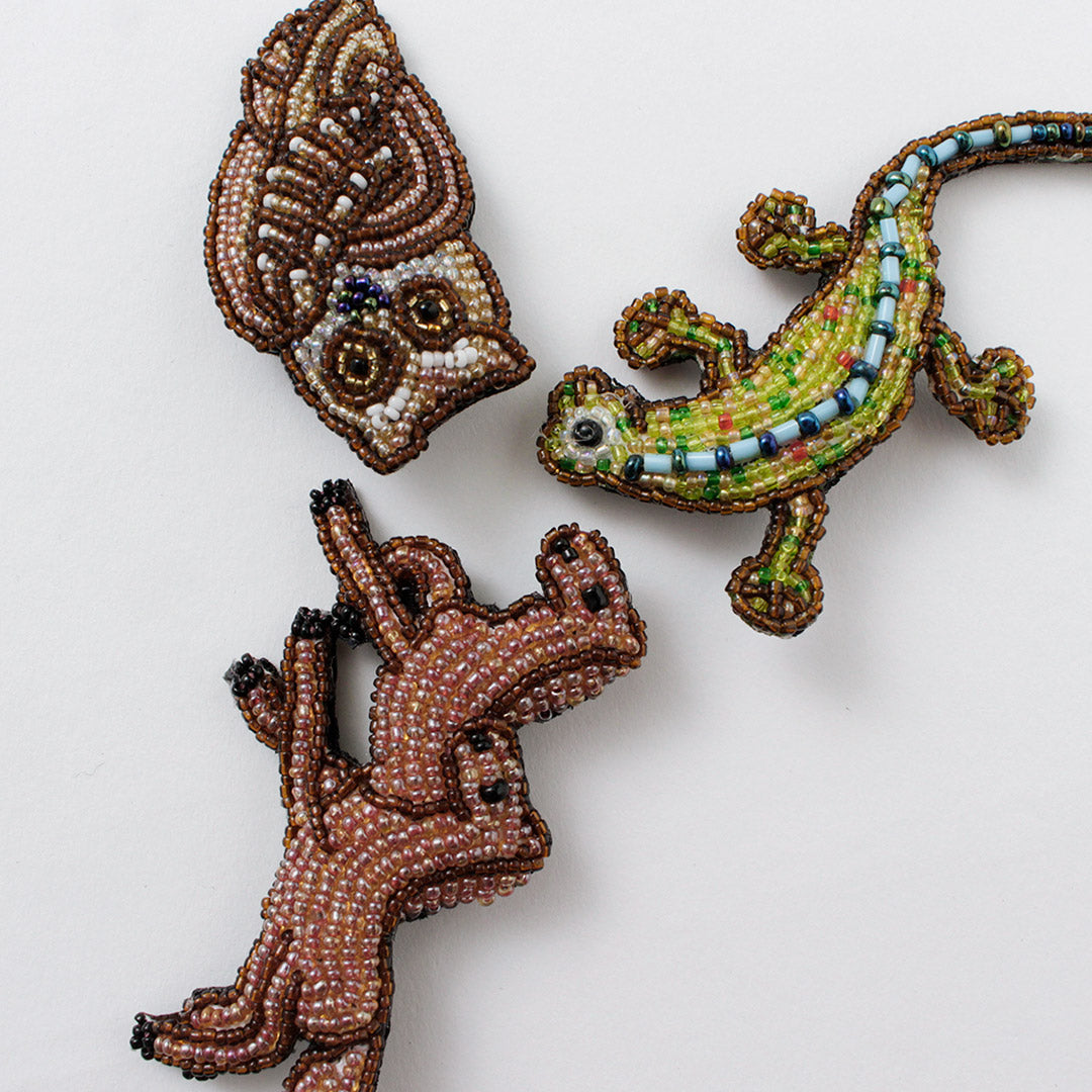 Accessoires perlés / badge d'épingle perle l