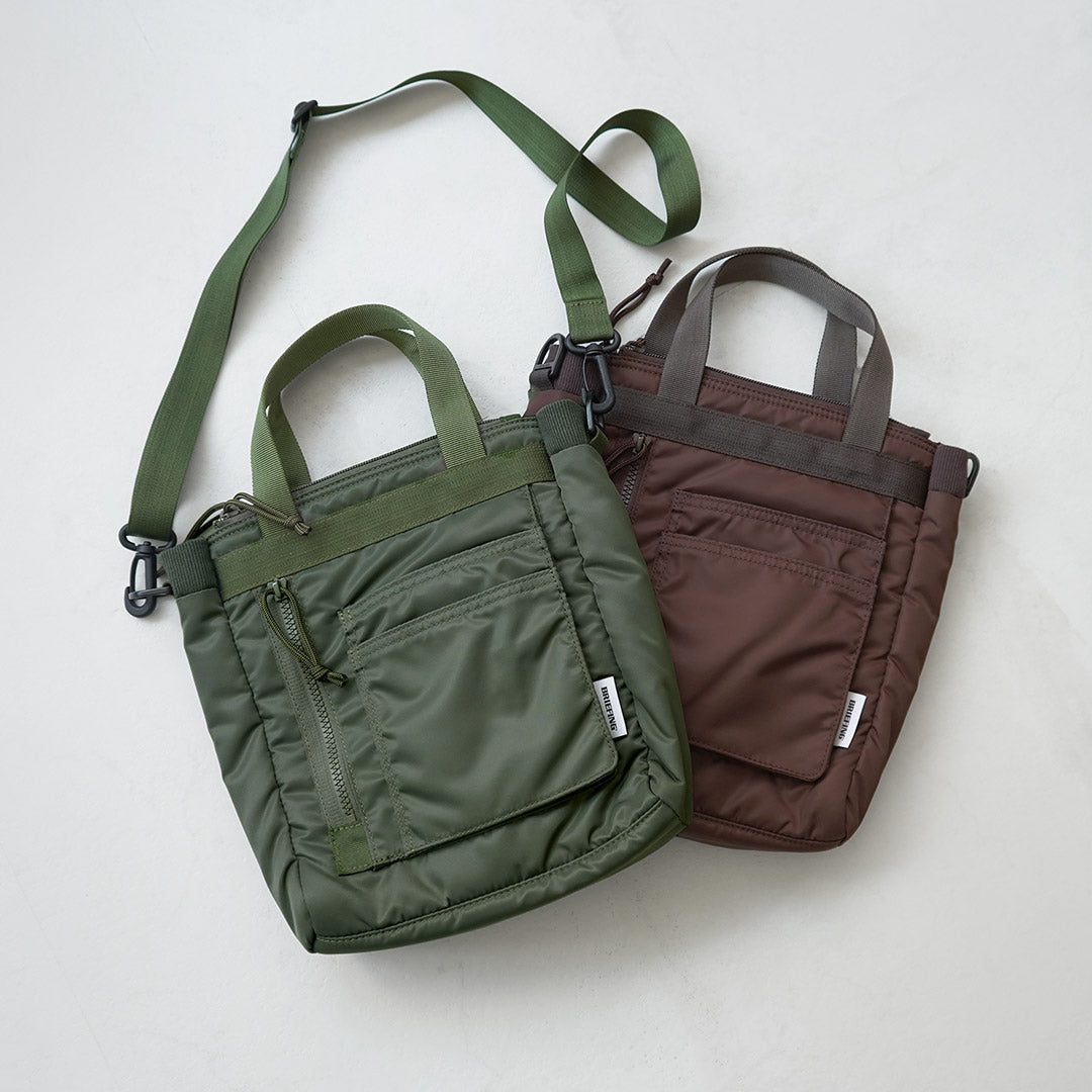 BRIEFING / Mini sac à bandoulière fourre-tout de protection bidirectionnelle