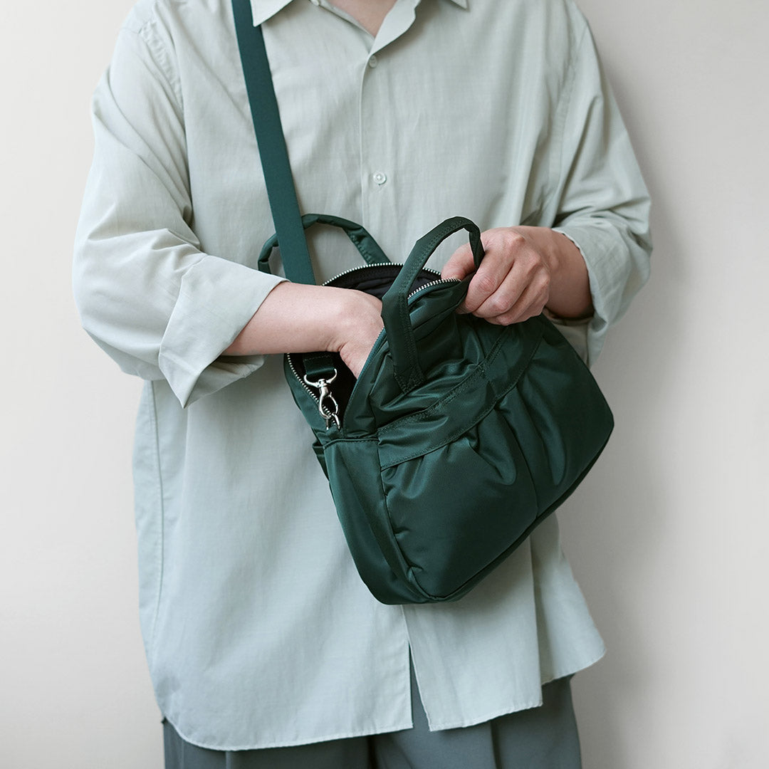 NEWBOOK / Bolso de hombro triangular Hangout / Bolso