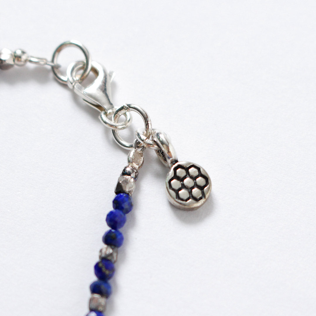 phaduA / Collier de perles taillées Lapis Lazuli 2 mm