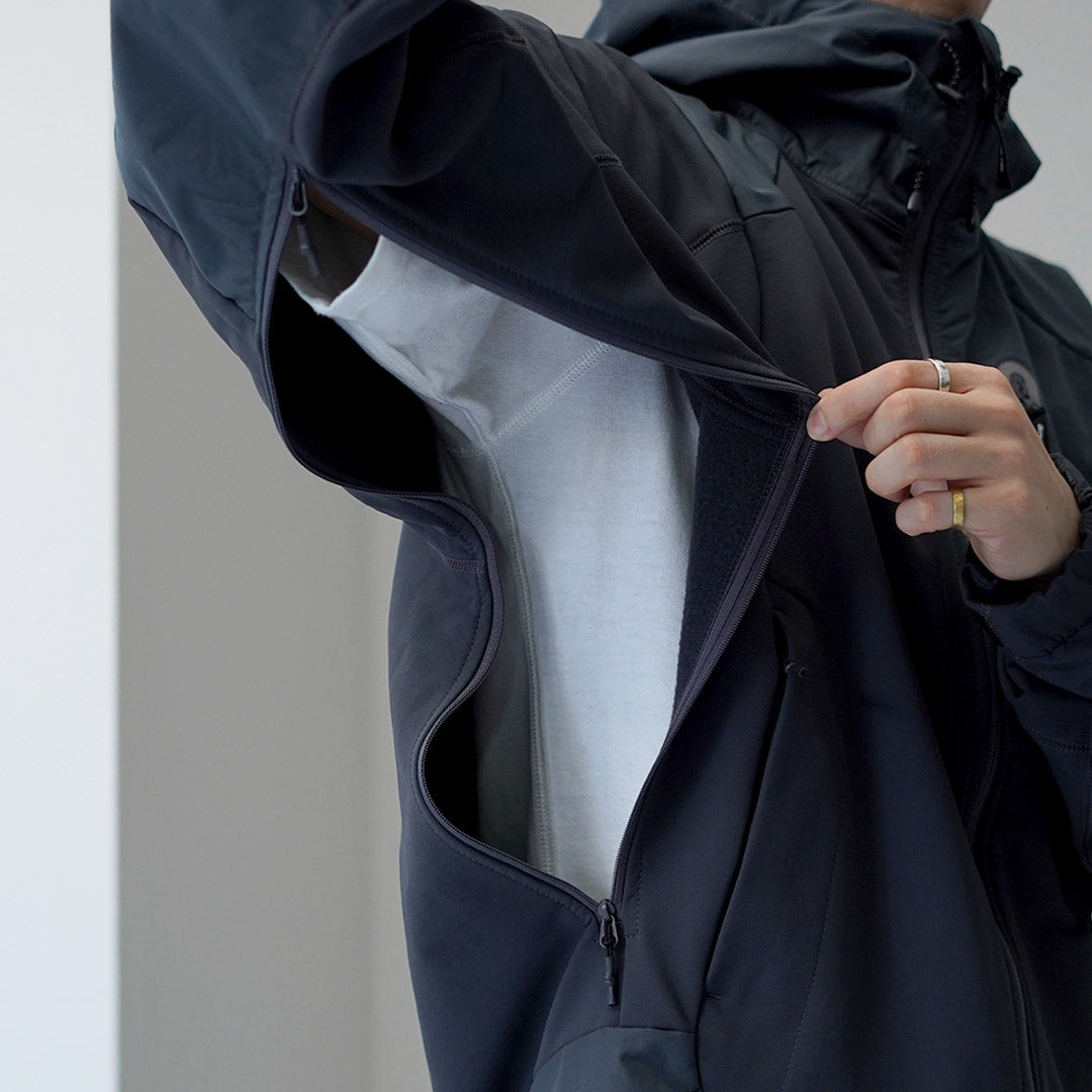 AND WANDER / Veste Shell Extensible