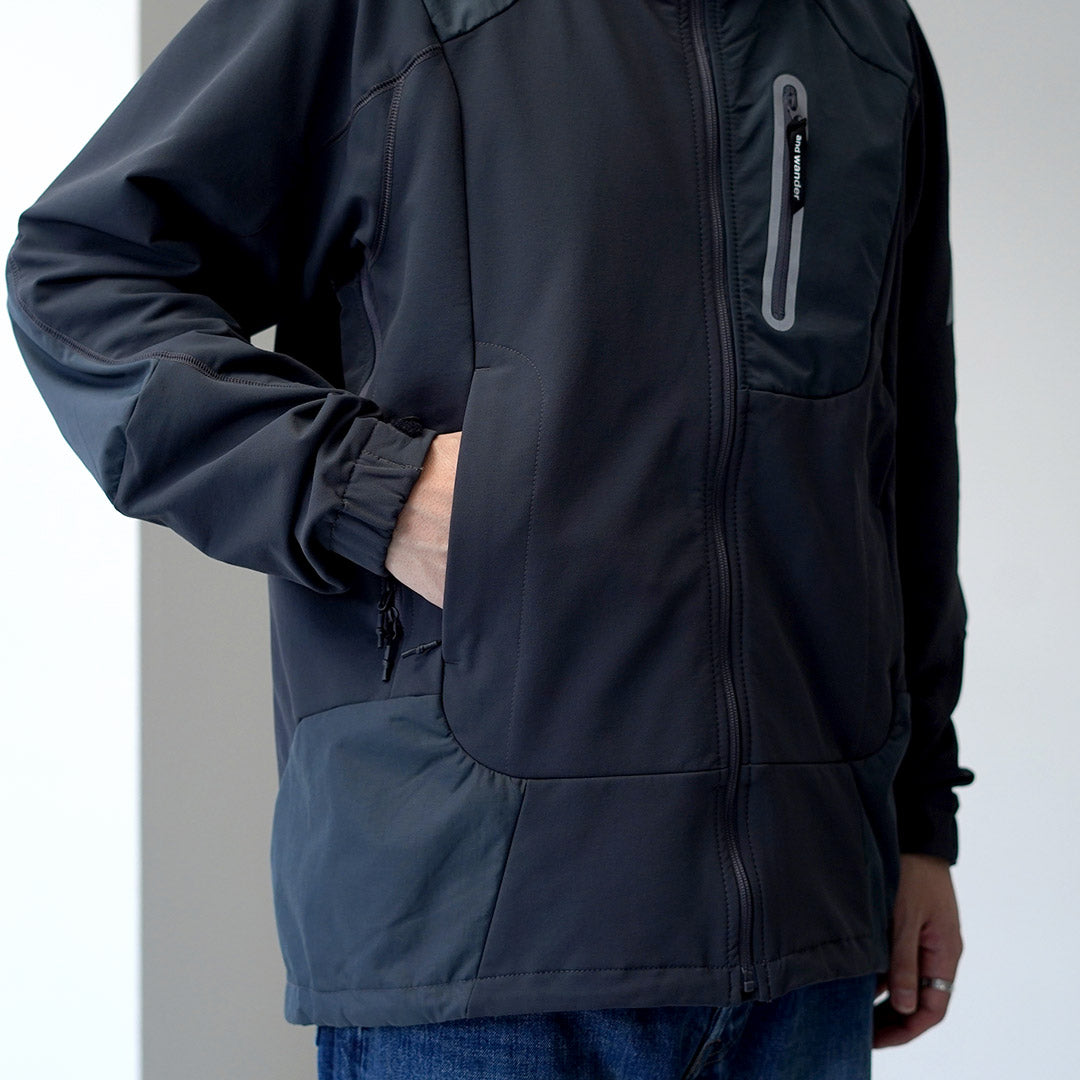 AND WANDER / Veste Shell Extensible