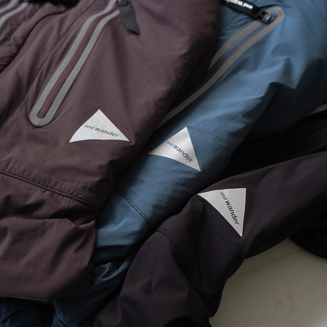 AND WANDER / Chaqueta sin cuello Alpha AIR