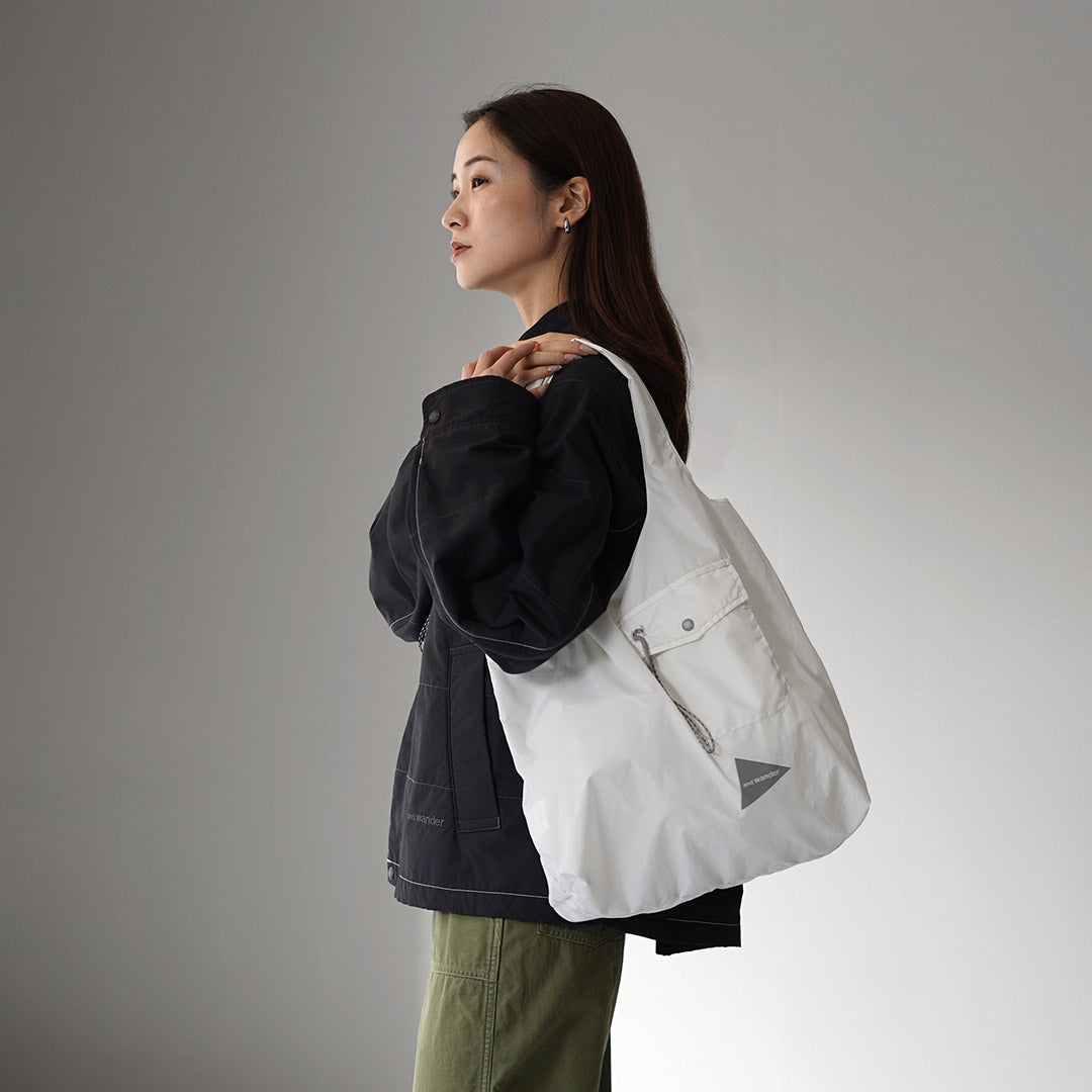 AND WANDER / Bolsa de bolsillo para comestibles